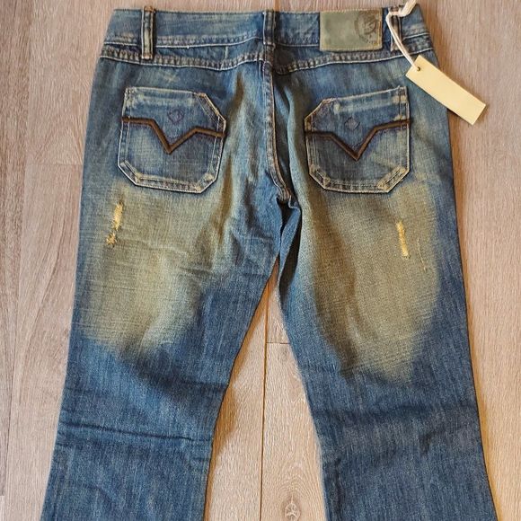 Diesel Distressed Boot Cut Jeans - Picture 4 of 11